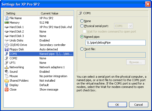 Summary dialog for Virtual PC COM1 serial port settings.